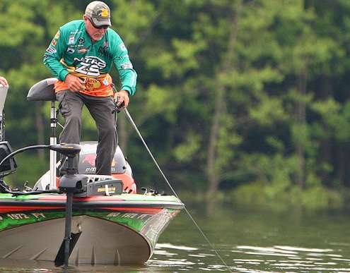 <p>He lets the fish tire and works it around the trolling motor.</p>
