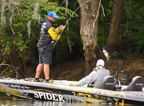 <p>After trying an assortment of baits, Lane hooks up and jerks another fish in the boat. </p>
