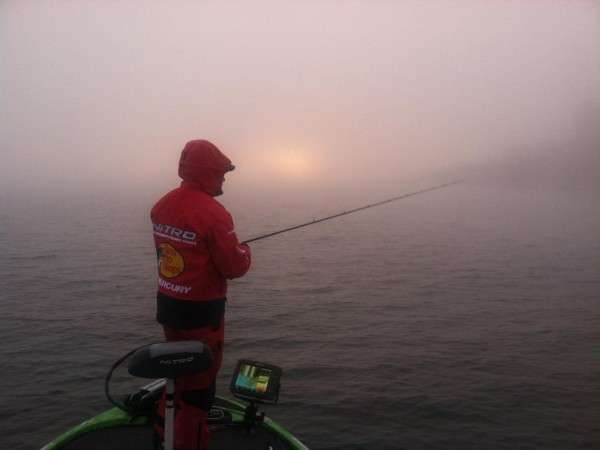 <p>Dennis Tietje isn't deterred by a little fog, as Bob King showed us. King reported Tietje had a limit of smallmouth by noon on Day Two.</p>
