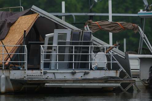 <p>This houseboat is a work in progress.</p>
