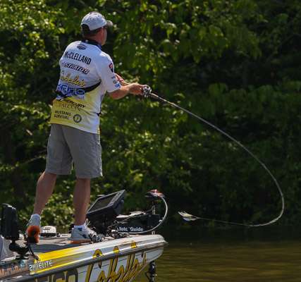 <p>Mike McClelland loads up his rod for a long cast.</p>
