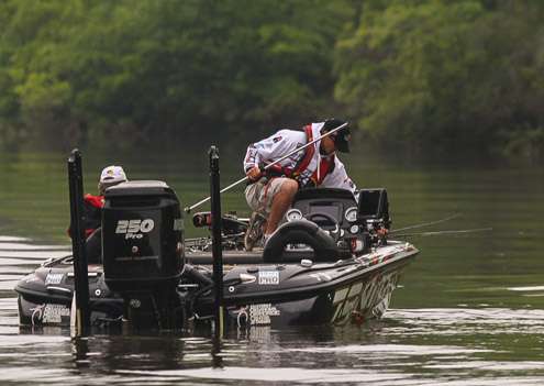 <p>Edwin Evers readies his rig for Day Three. He takes a moment to store his running lights before taking his first cast. Evers is in 3rd after Day Three.</p>
