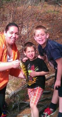 <p>
	Shannon Mallette makes it a point to spend time with her kids on the water. Here, sheâs catching yellow perch with her sons on a reservoir in Shelton, Conn.</p>
