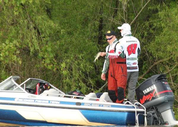 <p>Wisconsinâs Levi Warner puts a small under in the boat. Fish can only be kept if they are between 10-12 inches and over 18 inches. </p>
