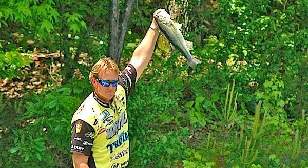 <p> </p>
<p>Reese shows off his bass to the fans before he culls.</p>
