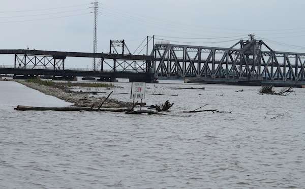 <p>Rising waters are nearing the bottoms of the bridges along the river.</p>
