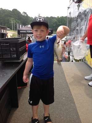 <p>Little Angler five year old Brennon Cooley of Merryville, La. shows off his catch.</p>
