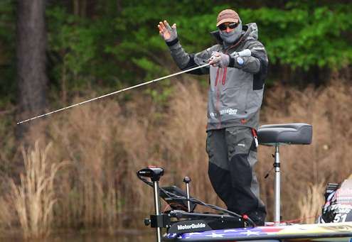 <p>Grigsby throws up his hands in frustration as he gives up on the fish. </p>
