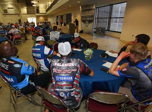 Anglers listen as B.A.S.S. Tournament Director Trip Weldon conducts their briefing. 