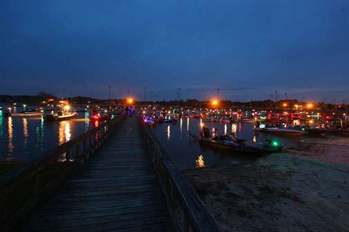 The bay of Lakeside Park is covered in navigational lights as Day One of the Bass Pro Shops Southern Open #3 begins on Logan Martin Lake in Pell City, Ala.
