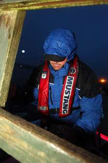 <p> </p>
<p>David Kilgore anxiously waits after being notified that his co-angler, Chad Thompson, was delayed getting to the launch due to access roads being flooded and shut down.</p>
