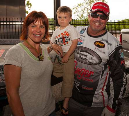 <p>John Murray is one happy man this week as he finds continued success on the Alabama River. John, his wife Amy and son T.J. stop for a quick photo before preparing for Day Three.</p>

