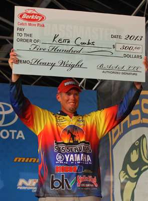 <p>Keith Combs grabs the Berkley Heavyweight Award from West Point Lake.</p>
