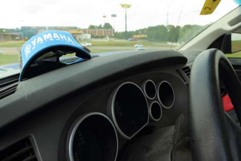 <p>He keeps his Yamaha hat nearby on the dashboard.</p>
