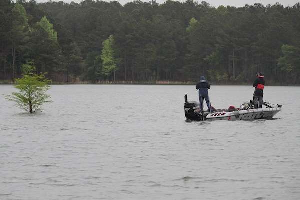 <p>Jason Christie works a shallow point as the rain starts to fall on West Point Lake. </p>
