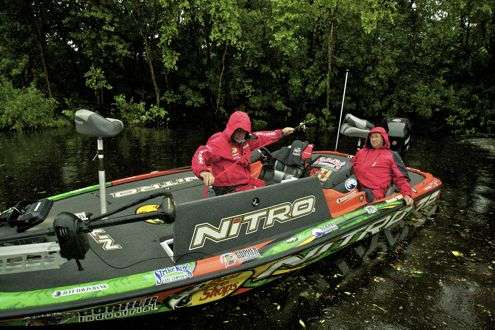 <p>Dennis Tietje, with the new start time announced, starts removing rods from his boat locker.</p>
