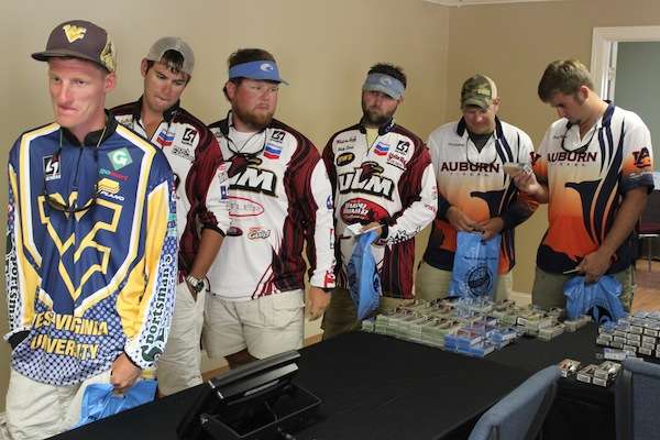 <p>West Virginia University's Edward Rude III (left) won the 2012 Carhartt College Series Midwest Super Regional on the Mississippi River.</p>
