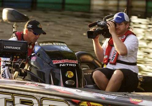 <p>Shaye Baker captures the action as Edwin Evers idles through the check-out.</p>
