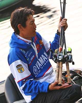 <p>Takahiro Omori has chosen his weapons for the day.</p>
