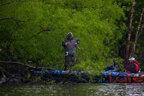 <p>As the weather breaks, Biffle hooks a short fish.</p>
