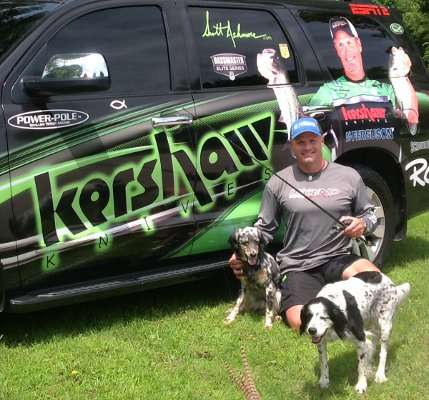 <p>Scott Ashmore's dogs bring him a lot of joy when he's home from tournaments. He calls Lola, the dog sitting next to him "Big Wheel," because she's so protective. Scout in the forefront is "the man" in the field. "She is a bird-hunting machine that is push-button and never runs out of gas," said Ashmore. "I am like a proud daddy at a football game when I watch her work the field."</p>
