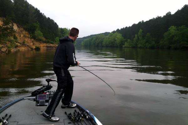 <p>Howell hooks up on his first cast of the day. Photo by Bassmaster Marshal Billy Black. </p>
