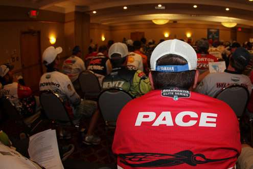 <p>Cliff Pace, the Classic champion, listens to the speakers at registration.</p>
