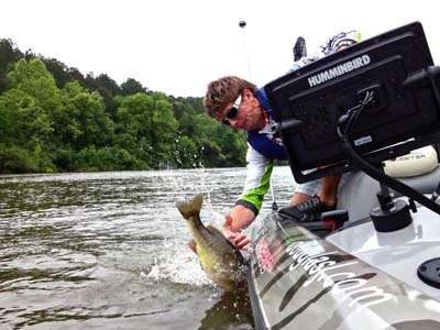 <p>Bassmaster Marshal Derrick Weston got a shot of Chad Pipkens just as he lost a fish and fell into the water on Day Three.</p>
