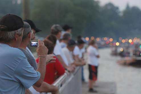 <p>Fans on the dock tried to capture images of friends, family members and angling heroes.</p>
