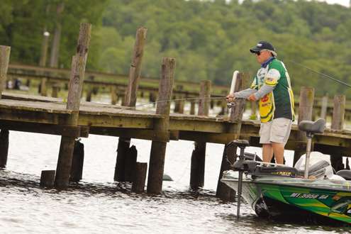 <p>Charlie Evans fishes around boat docks.</p>
