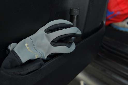 <p>Simms gloves keep his hands warm in extreme fishing conditions. </p>
