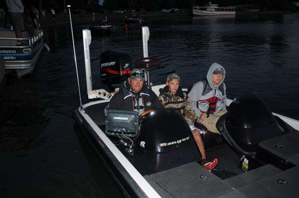 <p>Maryland juniors Justin Bronson and Ryan Appleby with boat captain Al Fiorille.</p>
