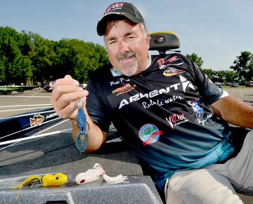 <p>Pete Ponds makes hay in the slop with the Bruiser Bait Intruder he's holding, a Trophy Series Scum Frog and a new Scum Frog bait that was introduced at the 2013 ICAST show (bottom right). He fishes all these baits with Vicious braided line.</p> 
