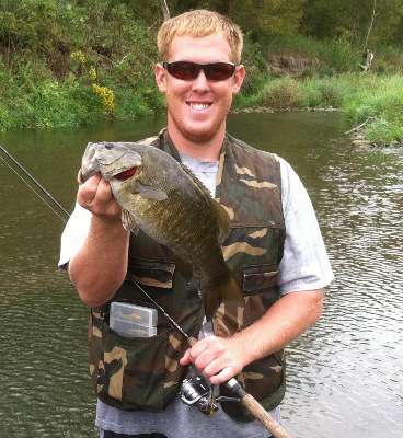 <p>Cody Salzmann caught this bass from Little Platte River in Wisconsin in September 2012. He estimated it was 16 inches long and 2 pounds or more.</p>
