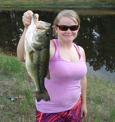 <p>"My fiancÃ©e, Brandi Sullivan, with her 4 1/4-pound largemouth caught in a pond on July 5," said Darrell Dugger. "This is her very first ever 'keeper' bass, and I couldn't be any more proud of her!"</p>

