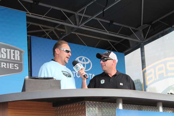 <p>Zacher chats with B.A.S.S. emcee Dave Mercer in front of the crowd at weigh-in. His sweepstakes prize also included cash, gear and gifts that added up to almost $5,000. </p>
