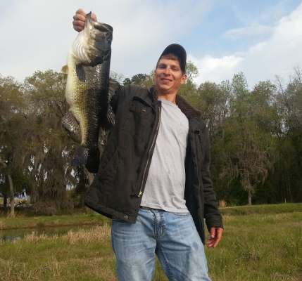 <p>Joseph Demember caught this bass on March 23 at a farm pond in Cherry Lake, Fla. "The weight was 9 pounds, 8 ounces," he said.</p>
