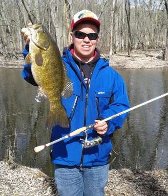 <p>Myles Tallada caught this 5.40 ounce smallie on a small river that dumps into Lake Champlain on April 22, his birthday.</p>
