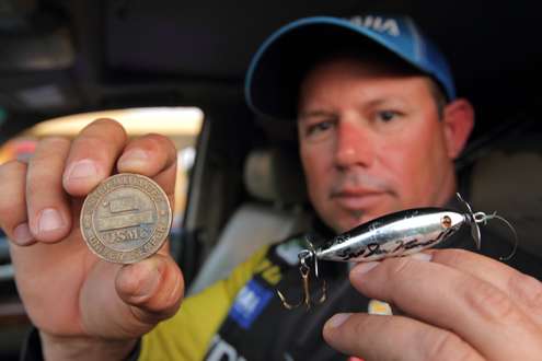 <p>Lane received this coin and lure from war veteran Joe Kolwolski and it has become his good luck charm. </p>
