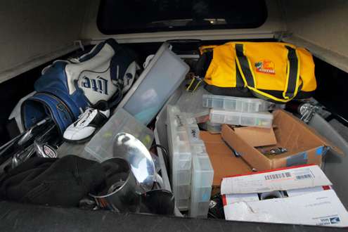 <p>Like most anglers, the back of his truck is full of equipment. </p>
