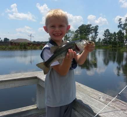 <p>"My son, Landon, caught this one in the pond in our subdivision on the third cast with his new Ike rod he got for his fifth birthday with a swimbait," said Thomas Breining.</p>
