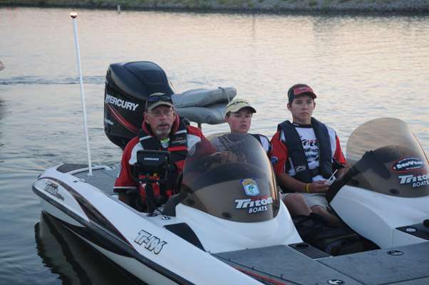 Ohio juniors Alex Datz and Daryk Eckert with boat captain Rodney Pieper.