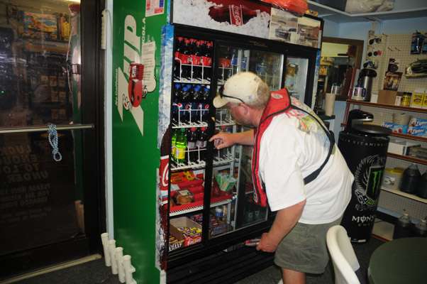 James Maisenbacher looks for a candy bar at the dock store.
