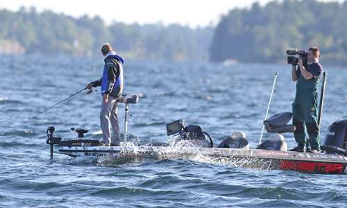 <p>Nearby, Chad Pipkens fights the waves that are more prevalent on Day 4.</p>
