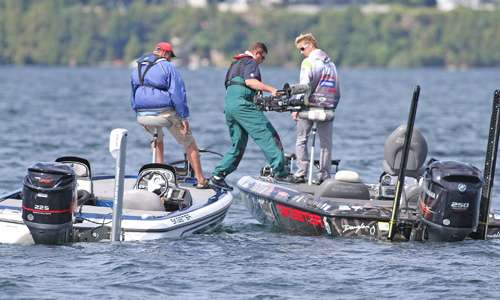 <p>Marty Dashiel moves from his camera boat to Chad Pipkensâ boat.</p>
