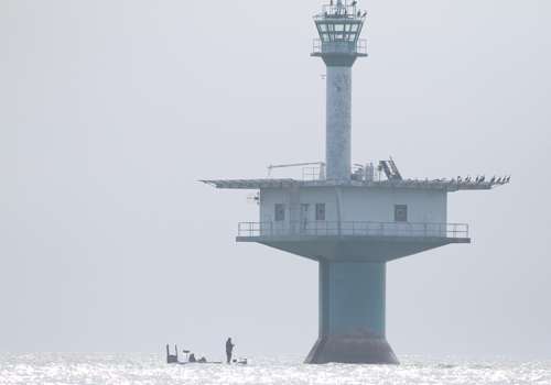 <p>A well-known landmark in the Pelee Island area is a lighthouse and helicopter pad.</p>
