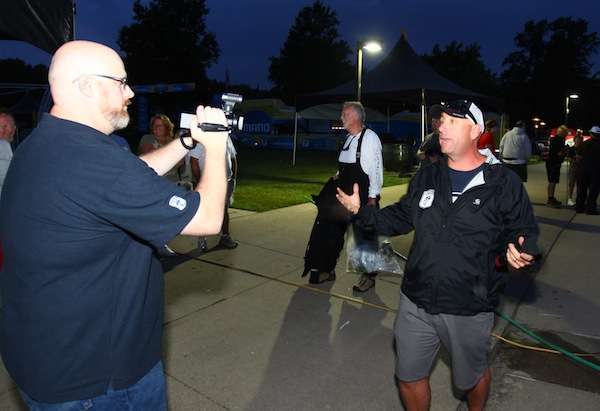 <p>Chris Mitchell shoots a quick video with emcee Dave Mercer prior to launch. </p>
