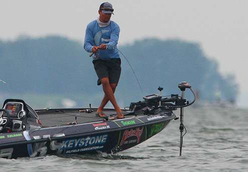 <p>Chris Zaldain fights his first fish of the day to the boat. </p>
