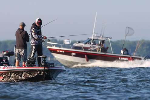 <p>Charlie Hartley keeps an eye on his electronics as he fishes offshore on Day 2.</p>
