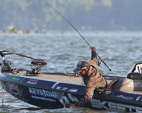 <p>Zaldain grips the bass and has his first fish of the day in the live well. </p>
